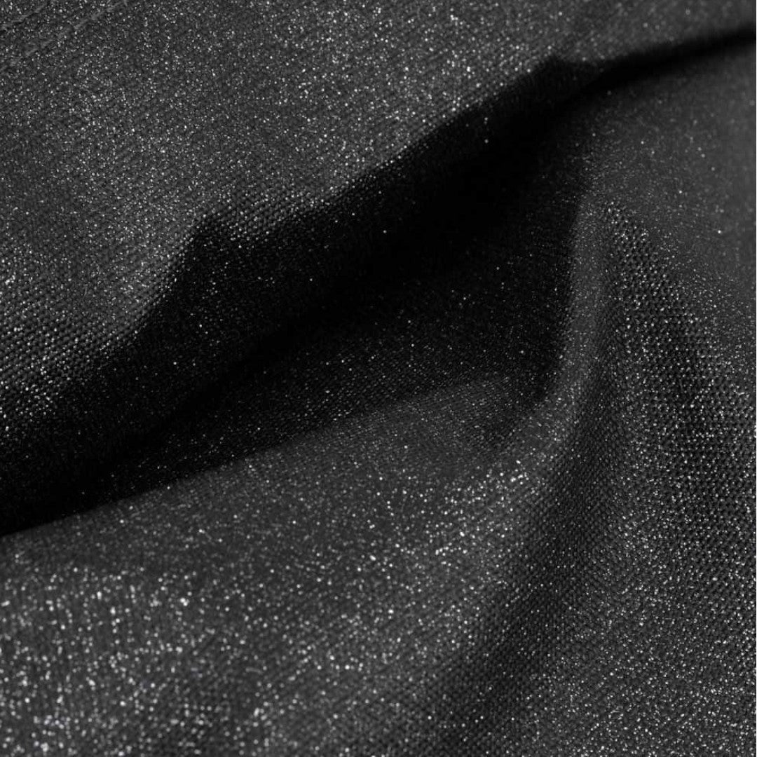 Close-up of the black glitter fabric texture of the Quiscuola.it – Zaini, Astucci e Diari Scuola Eastpak backpack.